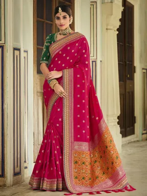 Exquisite Dark Pink Banarasi Silk Designer Saree Paired With Rich Embroidered Blouse